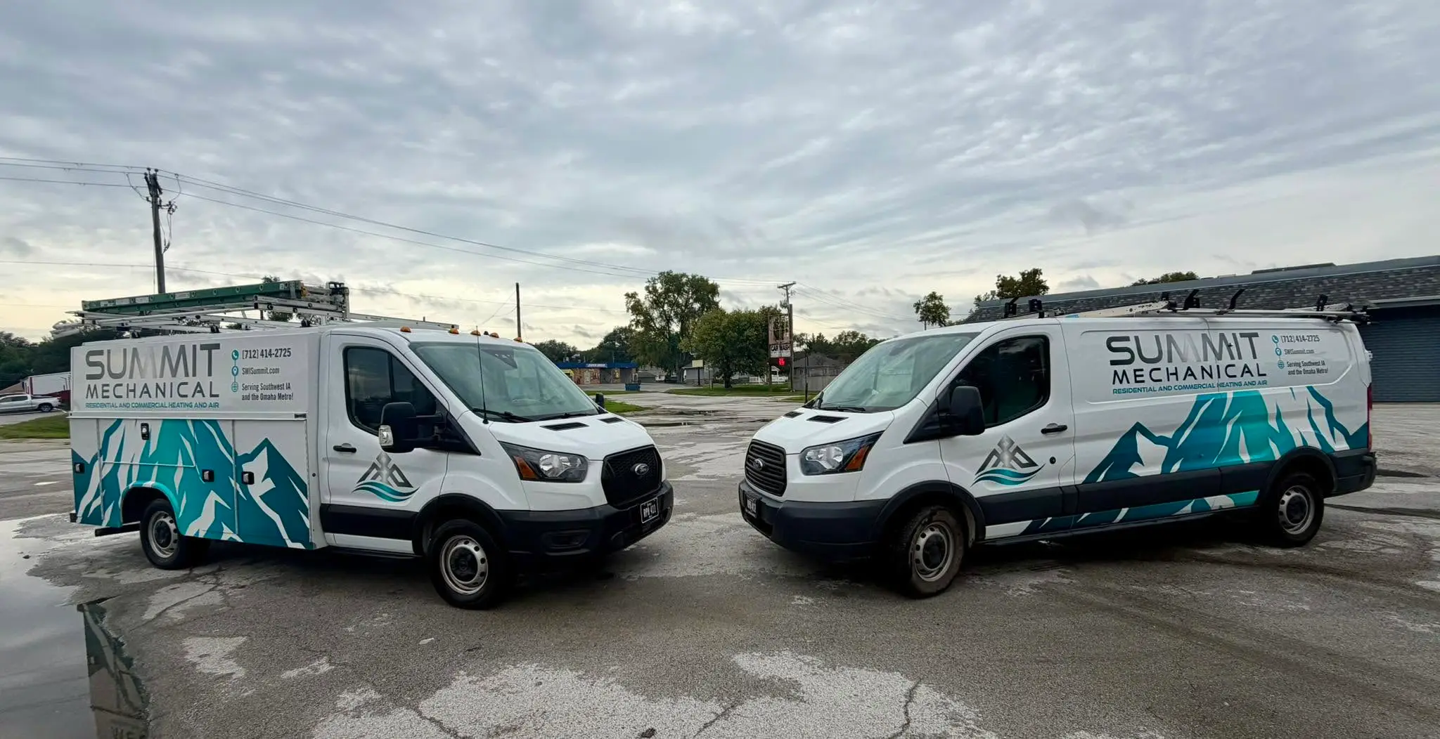 The Summit Mechanical team with their service vans in Southwest Iowa